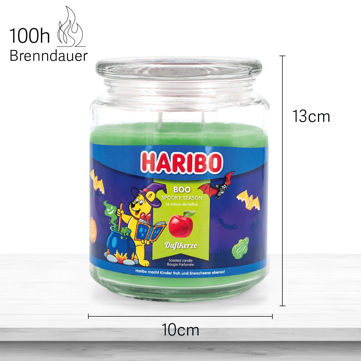 Haribo Duftkerze ‚Boo‘ (510g) im Glas - 13cm hoch, 10cm breit. Offizielle Lizenzkerze mit 100h Brenndauer, angenehmer Duft und liebevolles Haribo-Design. Dekoratives Wohnaccessoire und besonderes Halloween-Geschenk.