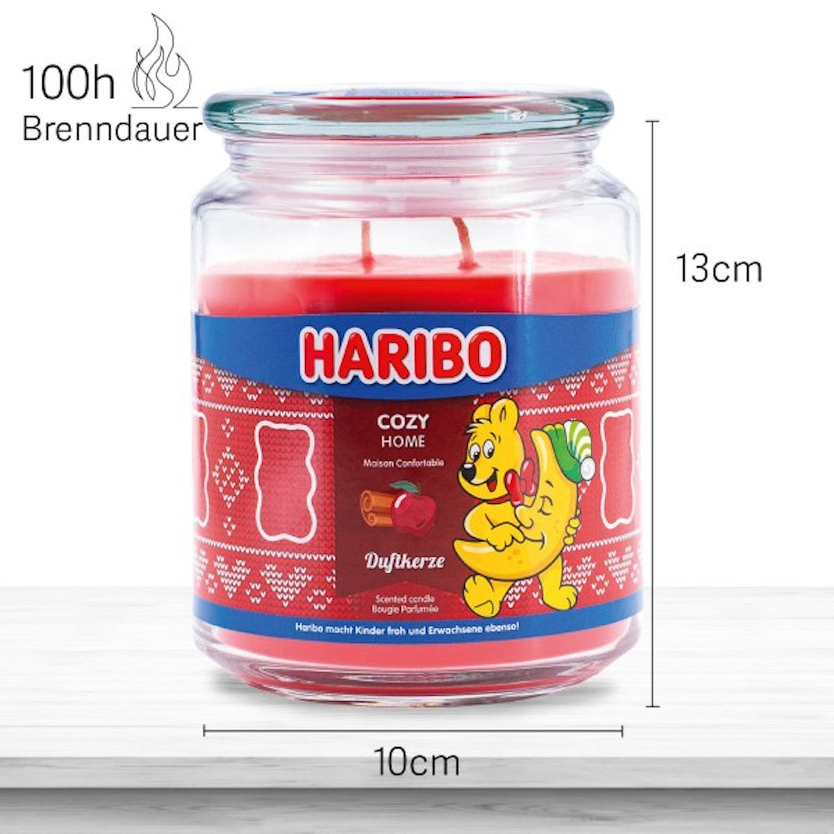 Haribo Duftkerze ‚Cozy Home‘ (510g) im Glas - 13cm hoch, 10cm breit. Offizielle Lizenzkerze mit 100h Brenndauer, angenehmer Duft und liebevolles Haribo-Design. Dekoratives Wohnaccessoire und besonderes Geschenk.