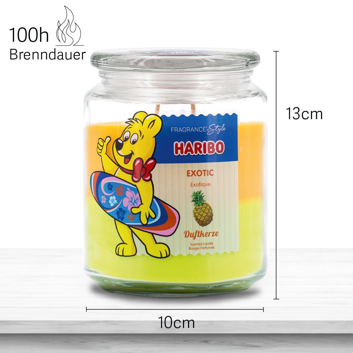 Haribo Duftkerze ‚Exotic‘ (510g) im Glas - 13cm hoch, 10cm breit. Offizielle Lizenzkerze mit 100h Brenndauer, angenehmer Duft und liebevolles Haribo-Design. Dekoratives Wohnaccessoire und besonderes Geschenk.