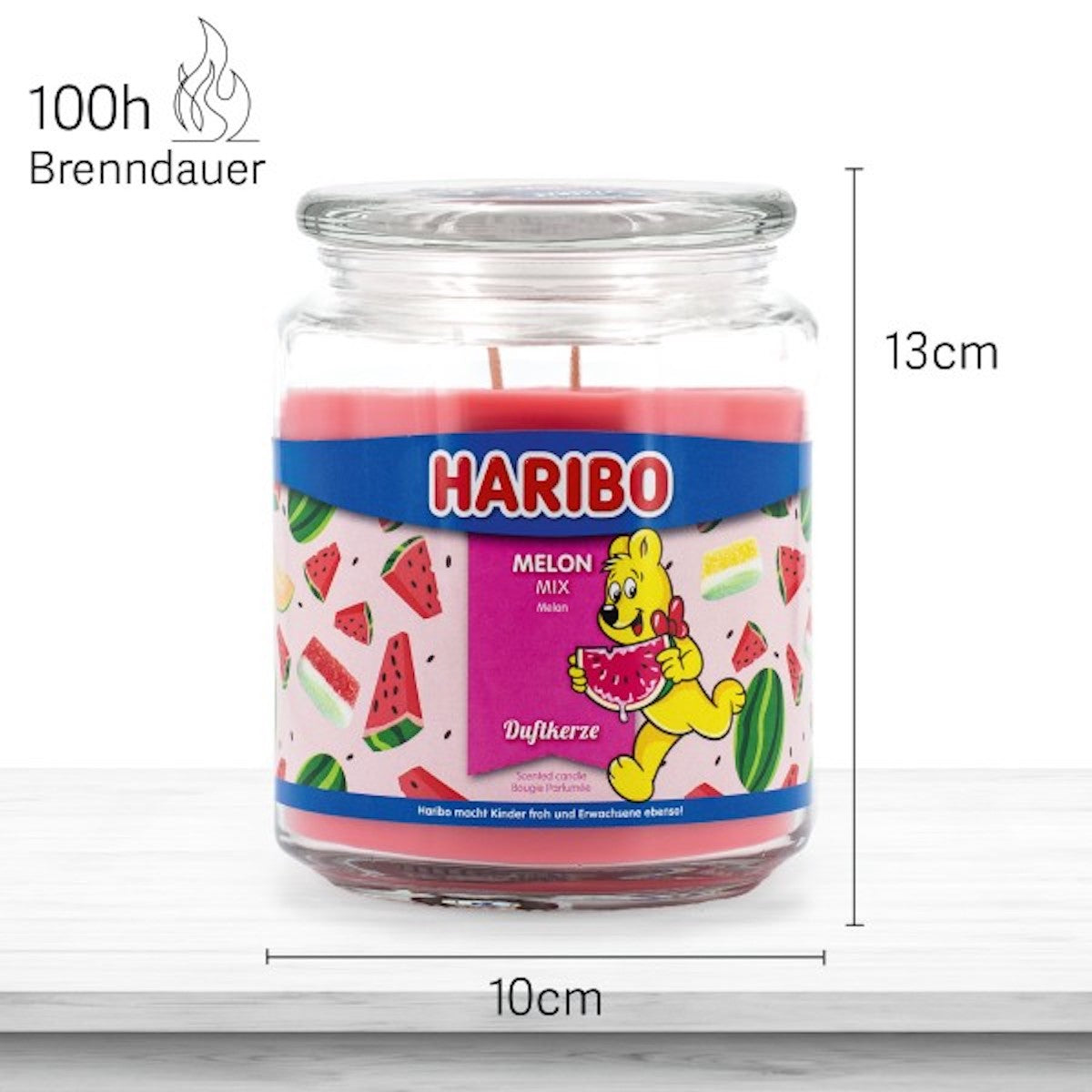 Haribo Duftkerze ‚Melon Mix‘ (510g) im Glas - 13cm hoch, 10cm breit. Offizielle Lizenzkerze mit 100h Brenndauer, angenehmer Duft und liebevolles Haribo-Design. Dekoratives Wohnaccessoire und besonderes Geschenk.