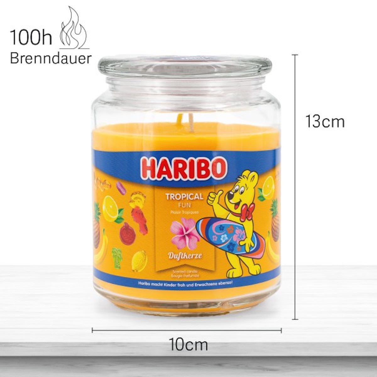 Haribo Duftkerze ‚Tropical Fun‘ (510g) im Glas - 13cm hoch, 10cm breit. Offizielle Lizenzkerze mit 100h Brenndauer, angenehmer Duft und liebevolles Haribo-Design. Stilvolles Wohnaccessoire und besonderes Geschenk.