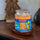 Haribo XXL-Duftkerze ‚Winter Fun‘ (510g) – offizielle Lizenzkerze mit winterlichem Duft (Orange, Zimt & Pfirsich). Winter-Design mit orangenem Wachs – Weihnachtsgeschenk für HARIBO-Fans und stylische Deko.