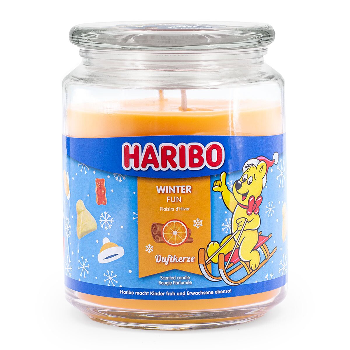 Haribo XXL-Duftkerze ‚Winter Fun‘ (510g) – offizielle Lizenzkerze mit winterlichem Duft (Orange, Zimt, Pfirsich). Weihnachtliches Design mit orangenem Wachs. Ideales Weihnachtsgeschenk und winterliche Dekoration.