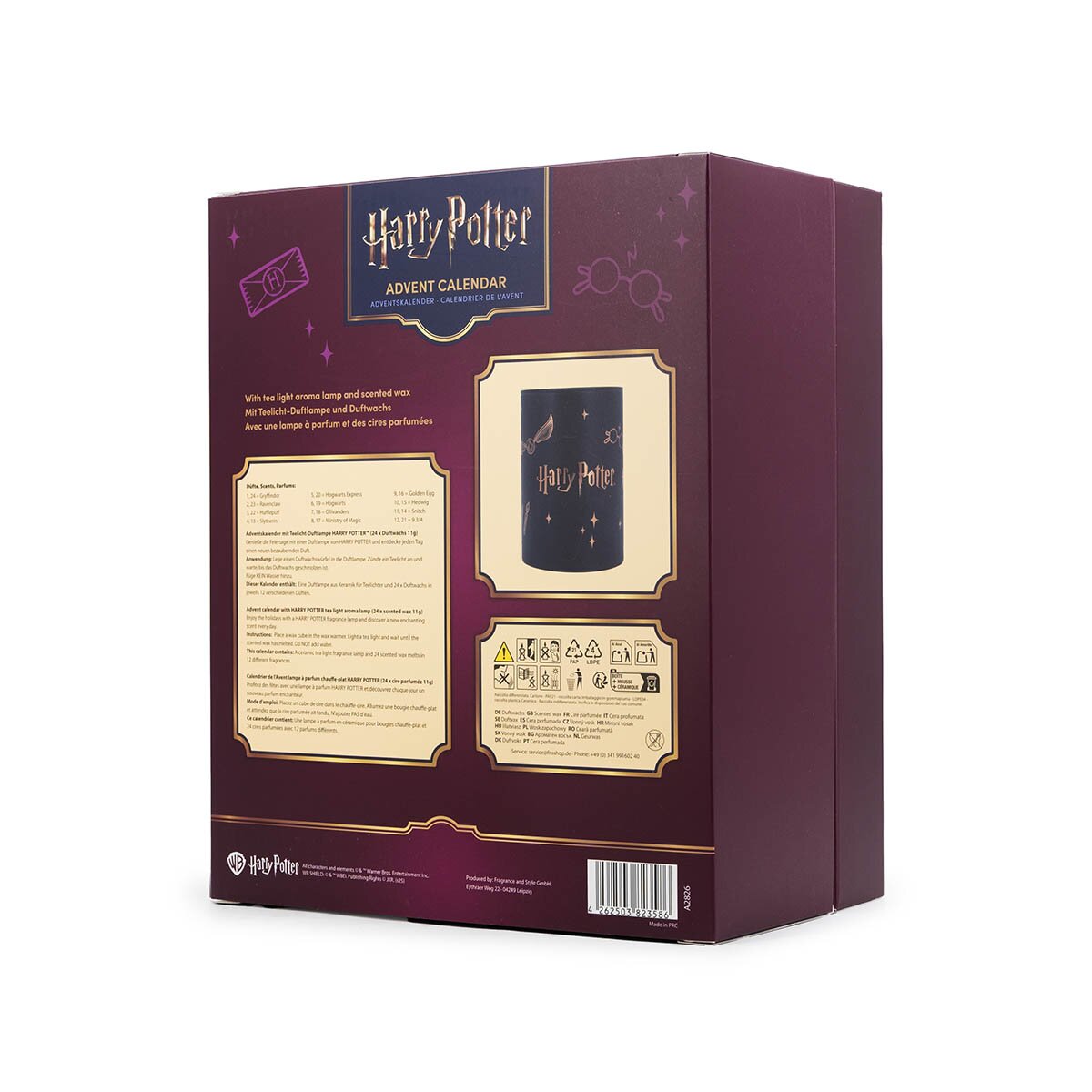 Harry Potter Adventskalender mit 24 veganen Duftwachsen und einer Teelicht-Duftlampe. Rückseite des weinroten Kalenders mit goldenen Harry Potter Motiven, einem Bild der Teelicht-Duftlampe und den Gefahrenhinweisen. 