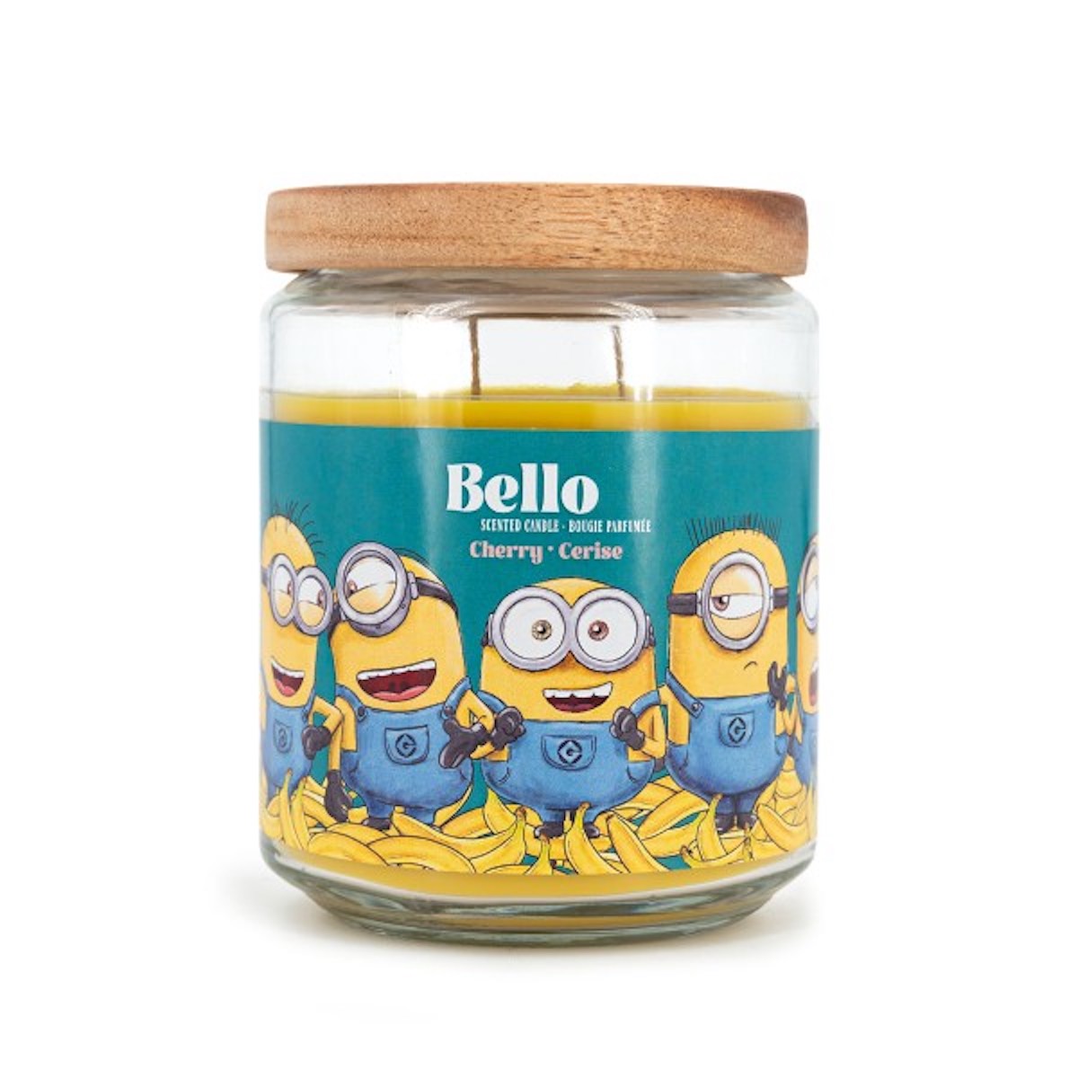 Minions XXL-Duftkerze ‚Bello‘ (510g) – Vorderseite der offiziellen Lizenzkerze mit türkisfarbenem Hintergrund, fröhlich lachenden Minions vor Bananen und sichtbaren Duftnoten, originelles Wohnaccessoire und Geschenkidee.