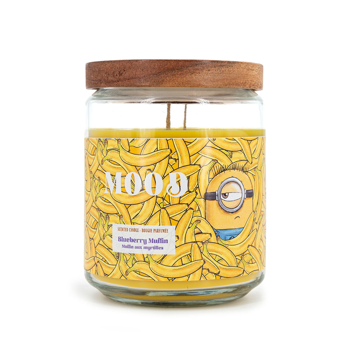 Minions Duftkerze ‚Mood‘ (510g) – Vorderansicht der offiziellen Lizenzkerze mit gelbem Minions-Motiv, Bananen und grimmig schauendem Minion. Vegane Duftkerze im Glas als stylische Deko oder Geschenk für Fans.