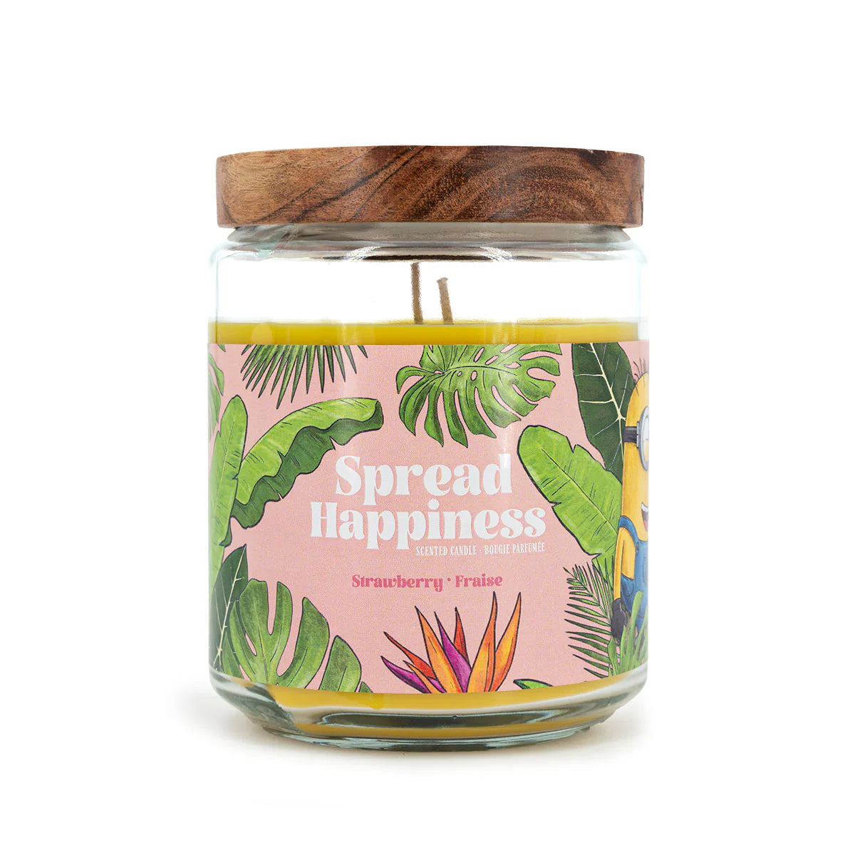 Minions Duftkerze ‚Spread Happiness‘ (510g) – Vorderansicht der offiziellen Lizenzkerze mit buntem Minions-Motiv, Palmen und orangenen Hintergrund. Vegane Duftkerze im Glas als stilvolle Deko oder Geschenk für Fans.